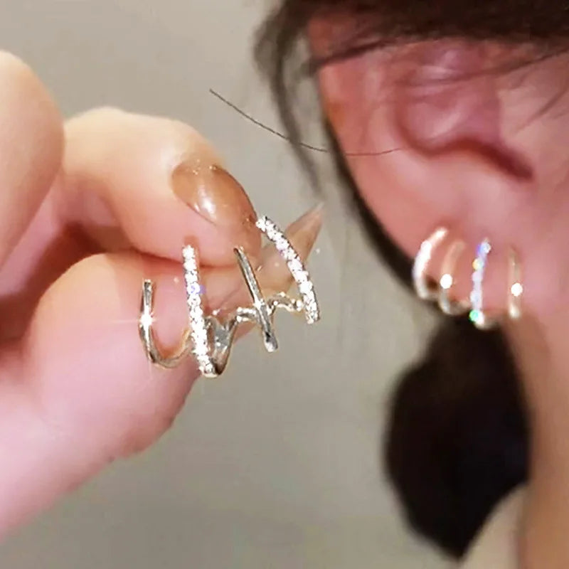 Four-prong geometric studs