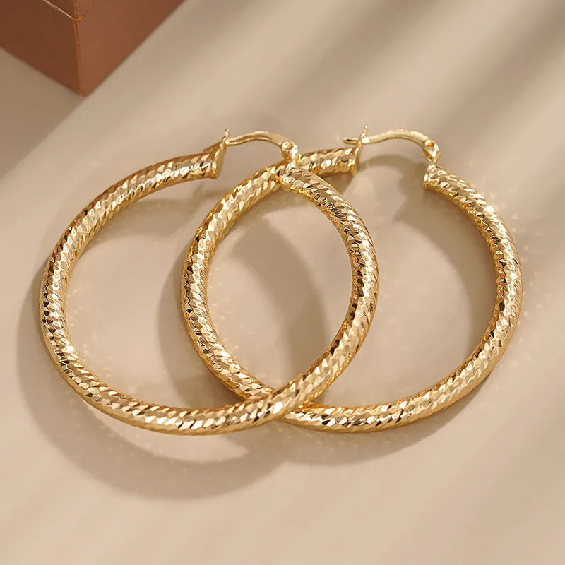Yellow-gold-tone hoop charm earrings