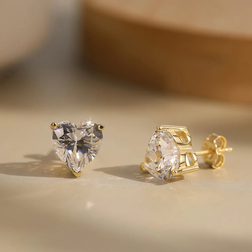 Heart-shaped moissanite-style studs, listed 0.5–4 ct