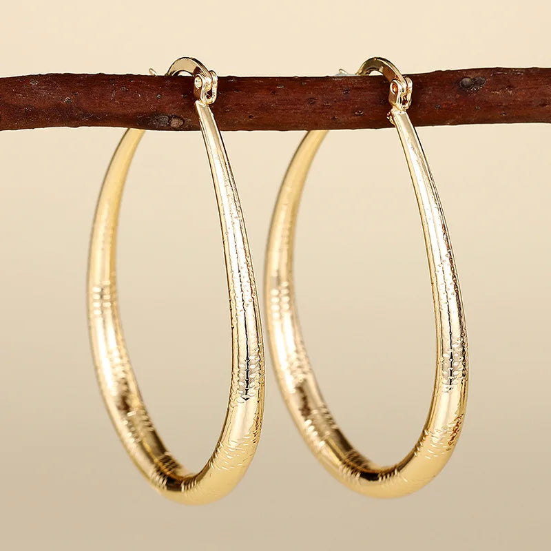 Yellow-gold-tone hoop charm earrings