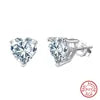 Heart-shaped moissanite-style studs, listed 0.5–4 ct