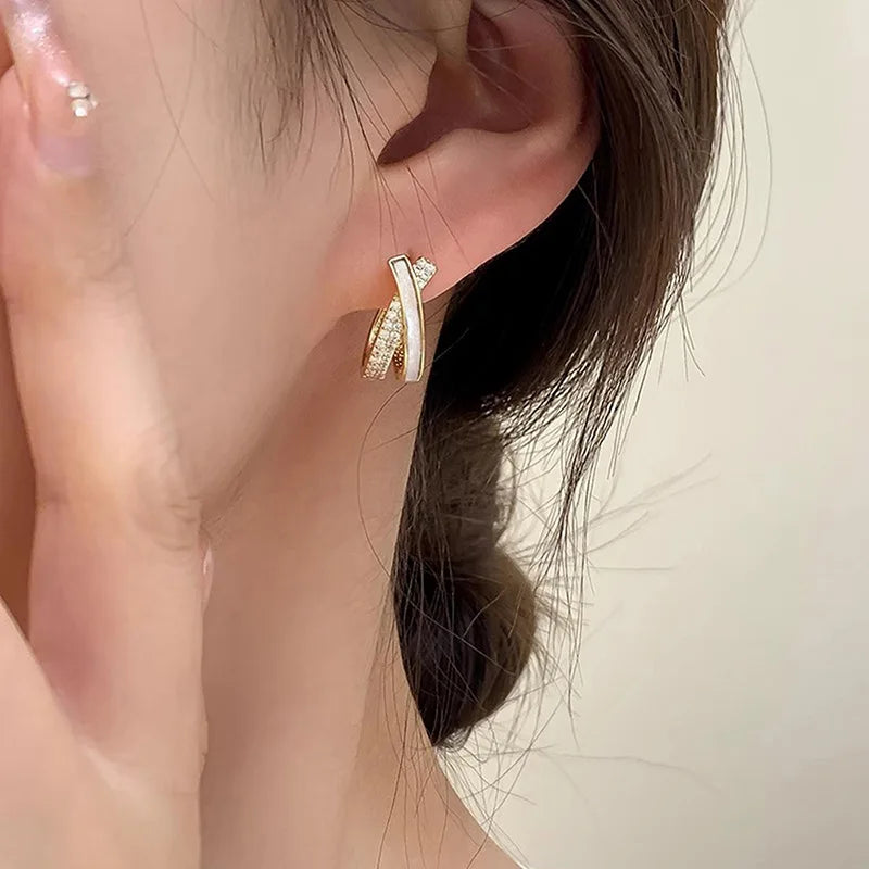 Cross-design ear cuffs