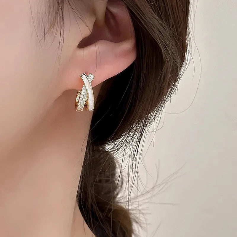 Cross-design ear cuffs